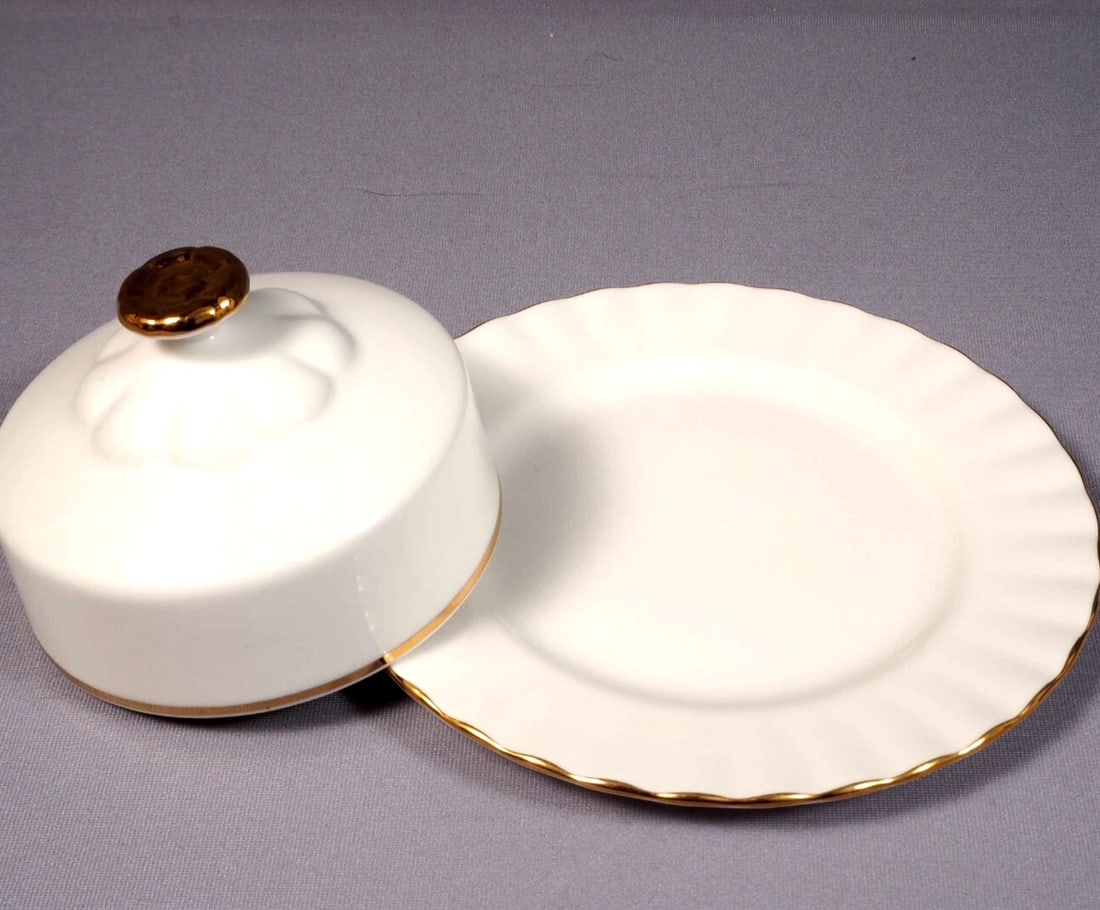 Royal Albert Val D'Or Butter Dish Domed Lid Under Plate Vintage England: This is a gorgeous Bone China Butter Dish with detached underplate from the famous Val D'Or collection by Royal Albert - Made in England. The rims of this pattern with bands gold on snow white backgro