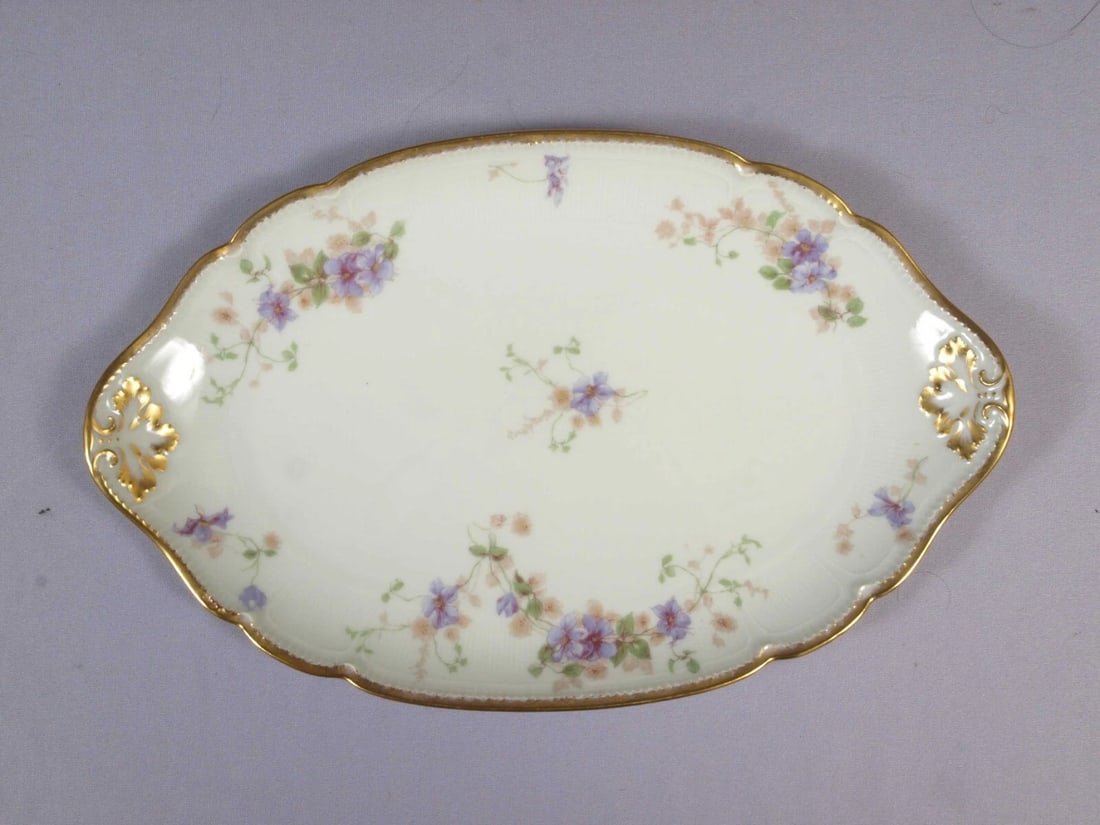Limoges CHField Haviland GDA France Oval Serving Platter Purple Clematis: This is a beautiful Small Oval Serving platter. It is made in CH Field GDA Haviland in Limoges, France. The platter is 12 1/4" by 7 3/4" at the rim. It is in good used antique condition with no crazin