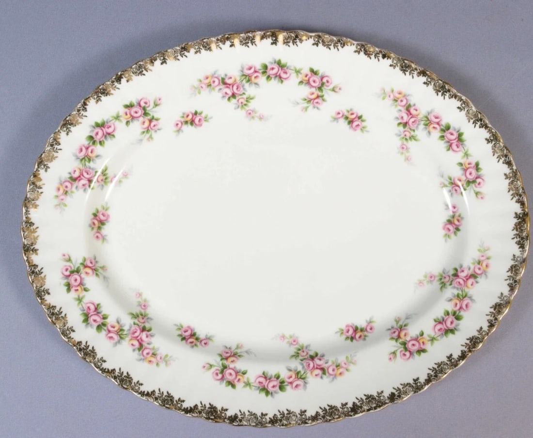 Royal Albert DIMITY Rose Oval ServingMeat Turkey Platter England Vintage: This is a stunning Large Oval Serving Platter. It is from the Dimity Rose pattern by Royal Albert - Made in England. The platter is properly marked with Royal Albert back stamp. The rims of this patte