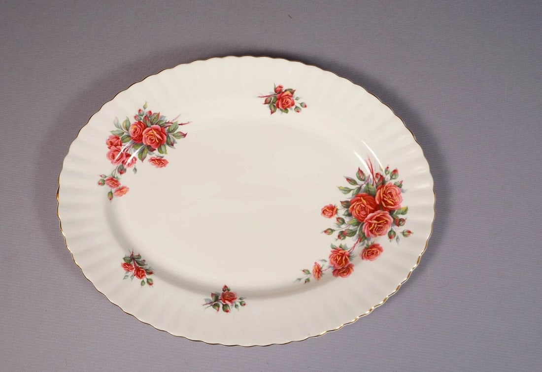 Royal Albert Centennial Rose Vintage England OVAL Meat Serving Platter: This is a gorgeous Bone China Oval Meat Serving Platter, from the famous Centennial Rose pattern by Royal Albert. This pattern is discontinued. The collection is created to celebrate Canada's centenni