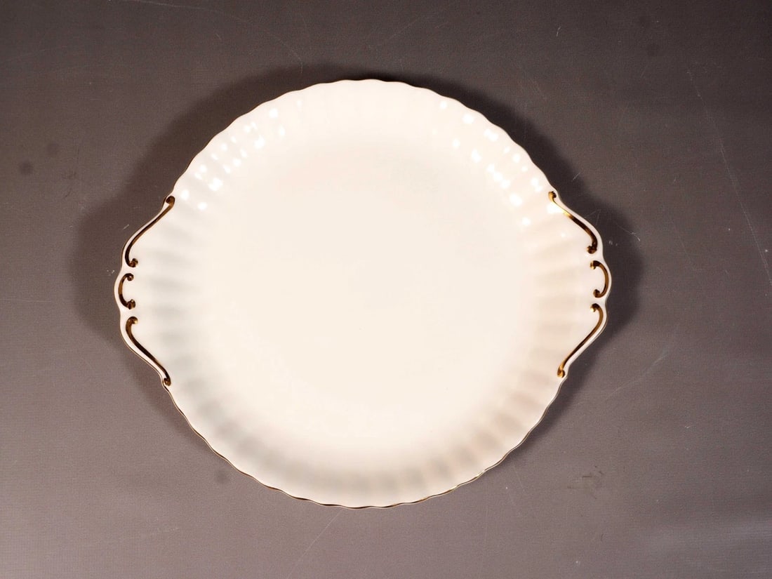 Royal Albert Val D'Or Cake Serving tray Platter Dish Handle gold white Vintage: This is a gorgeous Bone China Cake/Snacks/Dessert Serving Platter/Tray/Dish. The tray is from the famous Val D'Or collection by Royal Albert - Made in England. The rims of this pattern with hand-appli