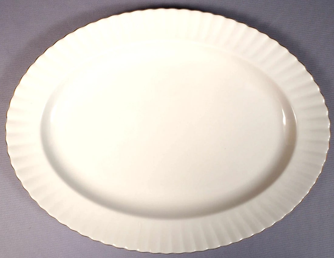 Royal Albert Val D'Or Oval Serving Platter Vintage England: This is a gorgeous Bone China Large Serving Platter from the famous Val D'Or collection by Royal Albert - Made in England. The rims of this pattern with hand-applied bands of 22-karat gold on snow whi
