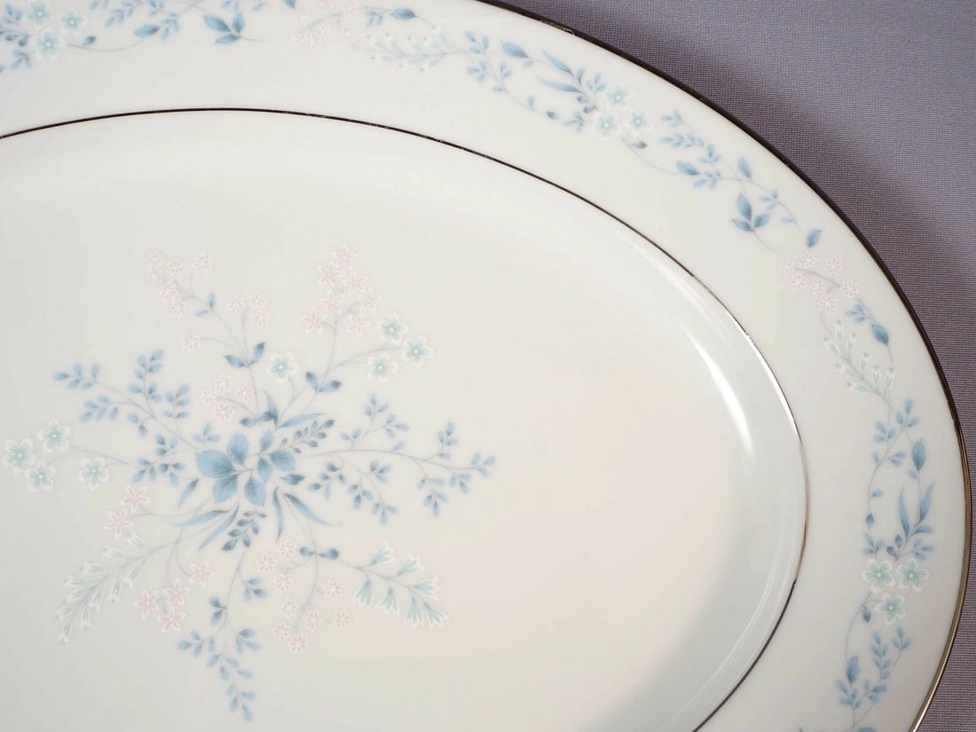 VINTAGE NORITAKE CAROLYN Oval Meat Serving Platter Platinum: This very beautiful oval Platter is made by Noritake in Carolyn pattern. The pattern was made between 1970 and 19994s. The pattern has blue and pink flowers, silver inner line and Silver/Platinum rim.