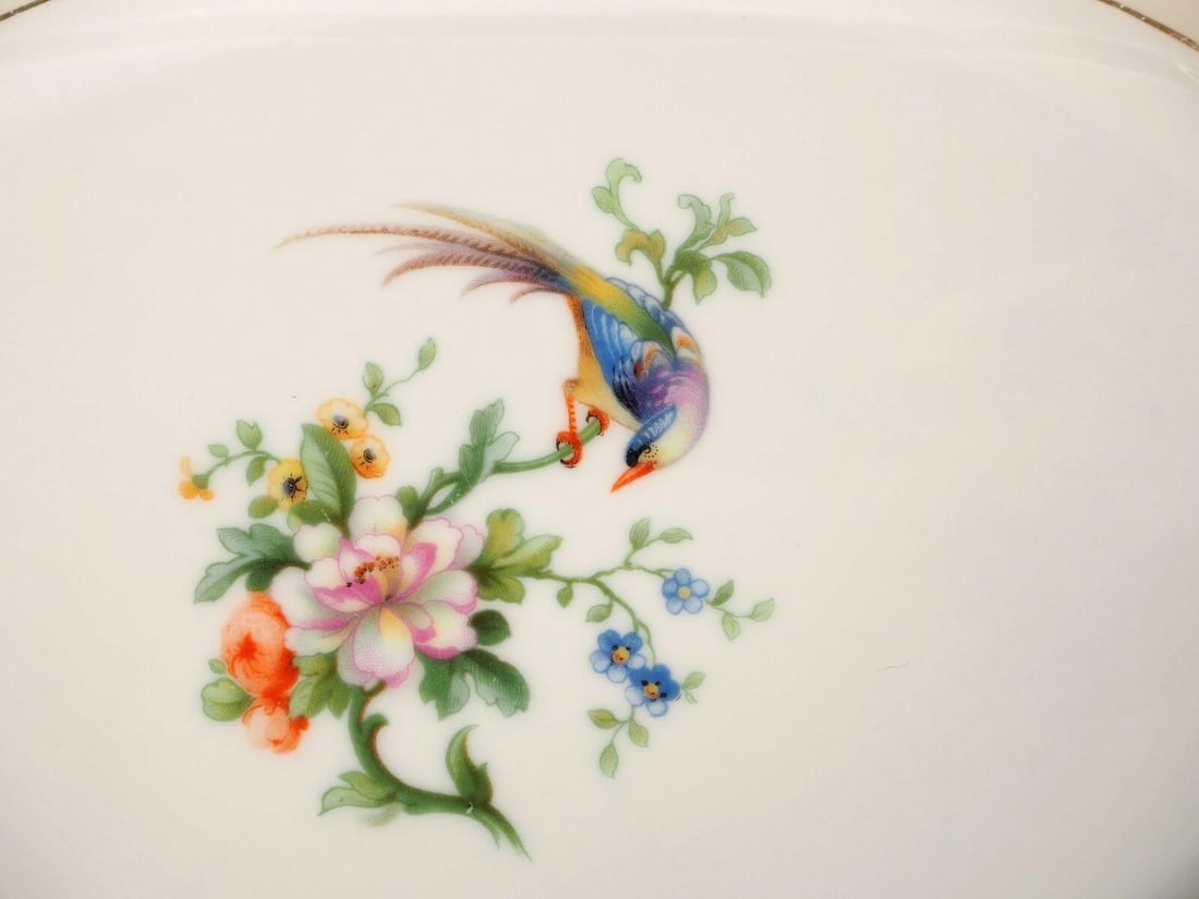 Imperial Heinrich & Co Selb Bavaria Songbird Oval Platter Germany: This is a beautiful Large Oval Platter made by Heinrich & Co Selb Bavaria. The platter is in the famous Songbird pattern. The platter has bird and flowers at the center, cream band with flowers and go