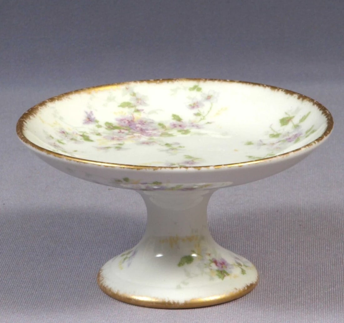 Limoges CHField Haviland GDA France Cake Stand Tray Dish Taza Purple Flowers: This is a vintage Small Cake Stand/Taza. It is perfect for serving a small, personal cake It is made in CH Field GDA Haviland in Limoges, France. The stand is properly marked with Limoges backstamp It
