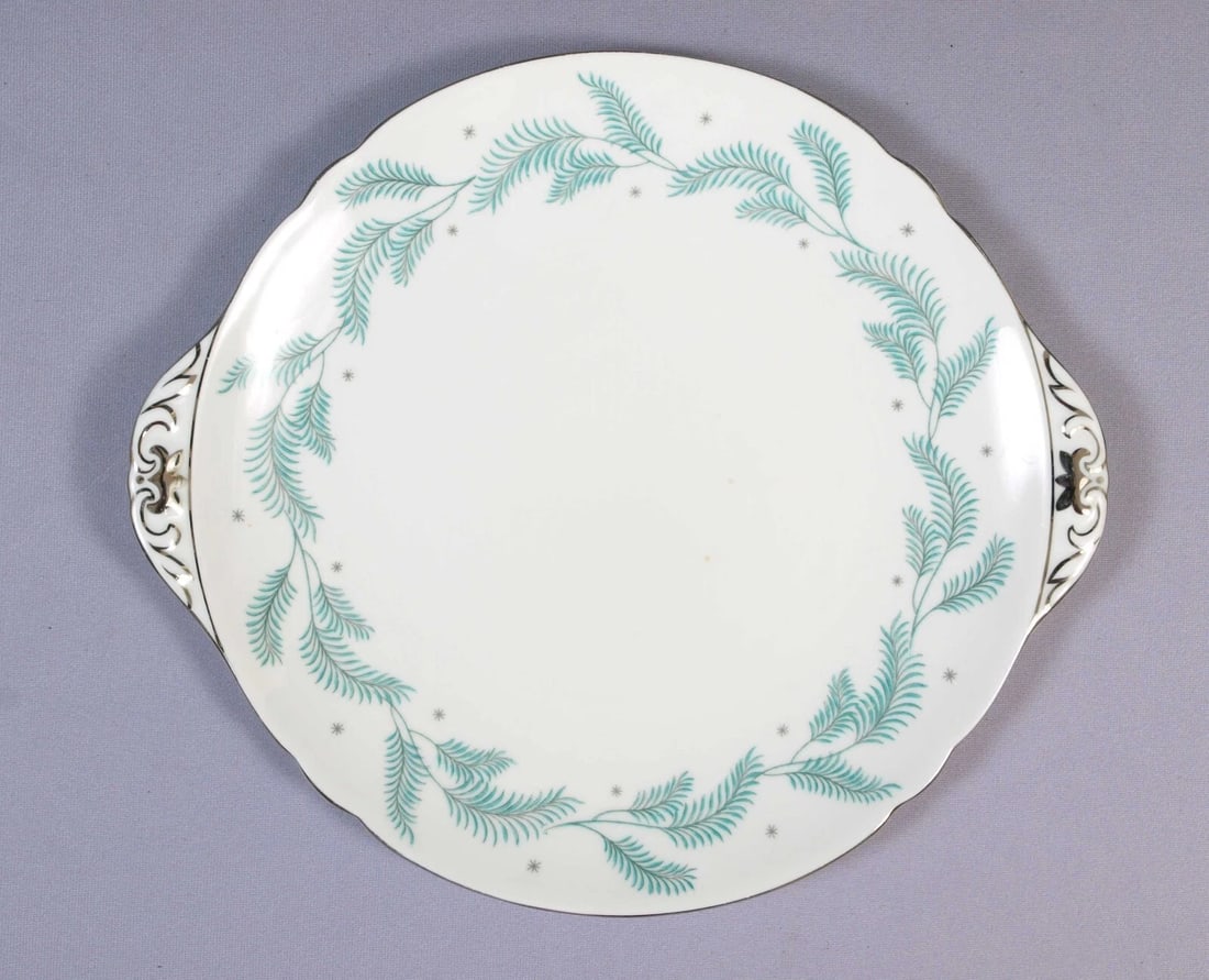Shelley SERENITY Cake Serving Plate Dish Tray 13791 Platinum Silver Rim: This is a beautiful and timeless Cake Tray/Dish made by Shelley England in the Serenity Pattern. This pattern is with green leaves and platinum/silver rim. The dish is 10" by 8 7/8". It is in very goo