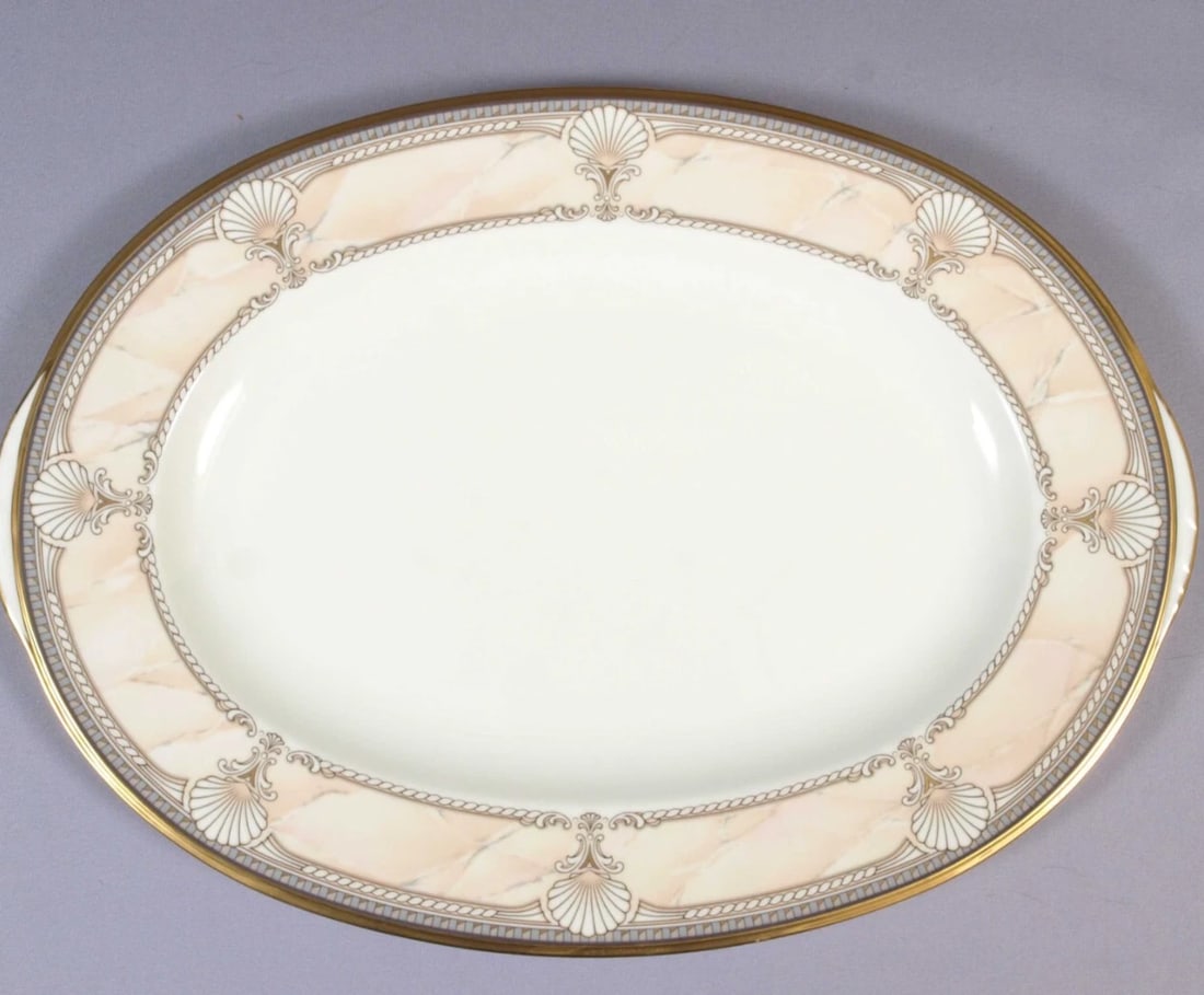 VINTAGE NORITAKE Pacific Majesty Large Oval Serving Platter 9771 Gold 14 3/4": This is a beautiful Large Oval Serving Platter is made by Noritake in Pacific Majesty pattern. The pattern was made around between 1988 and 2002. It is really majestic pattern with white raised shells