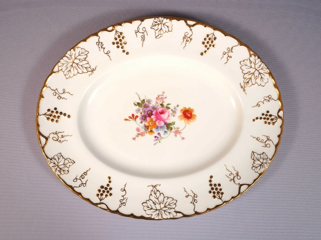 Royal Crown Derby VINE Vintage Posies Meat Oval Serving Platter 839130: This is a rare and absolutely beautiful Large Serving Platter. The platter is from VINE Pattern with Posies center by Royal Crown Derby. The pieces are enhanced with elaborate gold grape and leaves at
