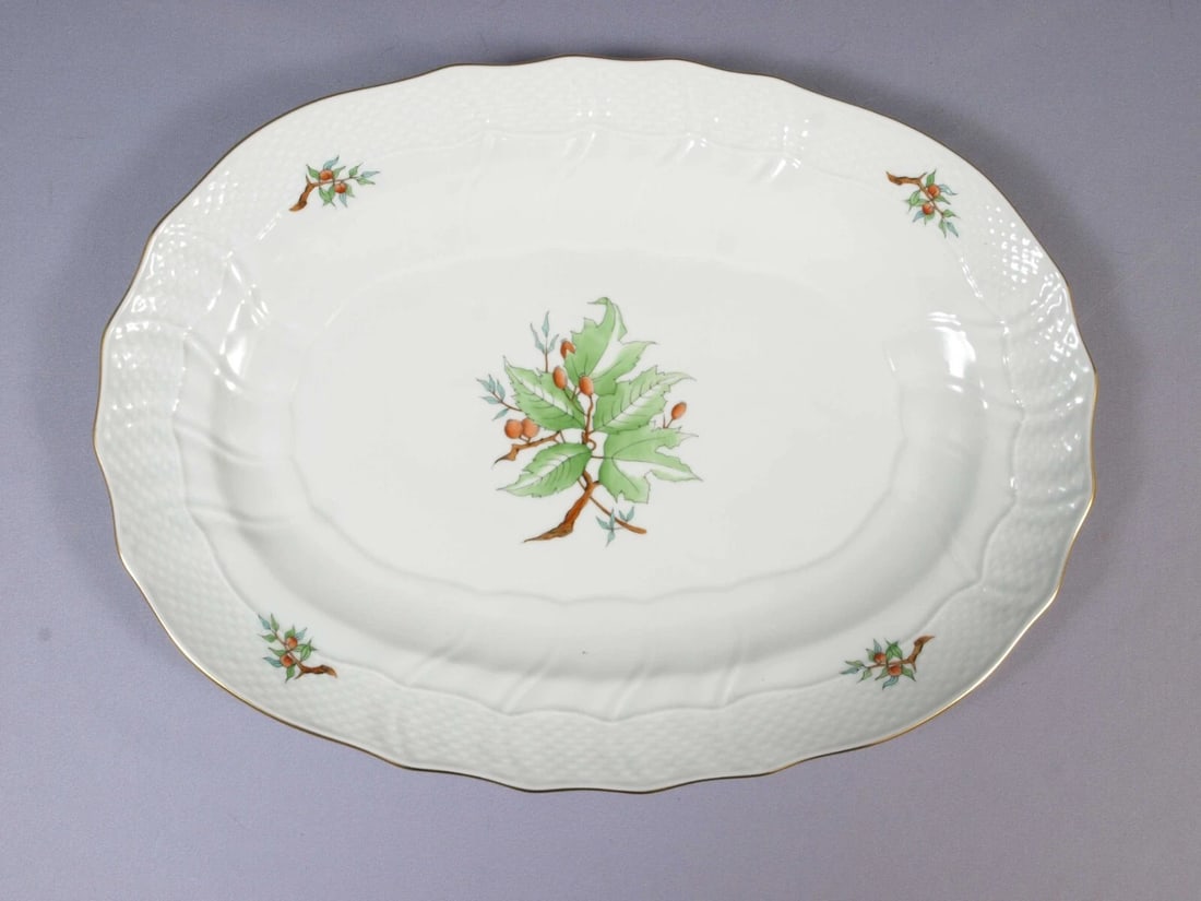 Herend LARGE Oval Meat Platter Serving Tray Rosehip Pattern Hungary: This is an exceptional Large Serving platter made by Herend in Hungary. It features a rosehip in the center and around the embossed rim. The platter shows the high quality of Herend porcelain It is ma