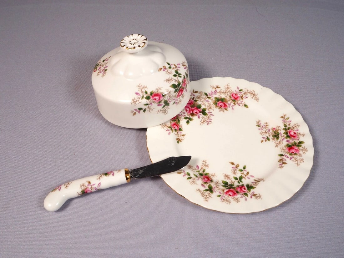 Royal Albert Lavender Rose Bone China Butter KNIFE Dish Domed Lid Under Plate: This is a gorgeous Bone China Bone China Butter Dish with underplate and a butter knife. The dish is from the renowned Royal Albert Lavender Rose collection. The dish is properly marked with Royal Alb