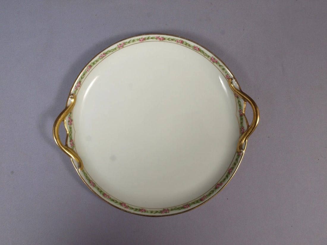 Limoges France CH Field Haviland GDA Cake Tray Platter CHF404 Rose Garland: This is a gorgeous Cake serving platter made in Limoges, France by GDA CH Field Haviland . The pattern features pink roses. The patterns possibly is Rose Garland. The platter is 9" with the handles by