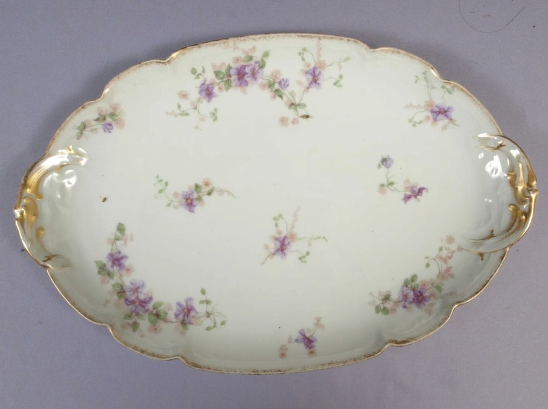 Limoges CHField Haviland GDA France Oval Serving Platter Dish Purple Flowers: This is a beautiful Oval Serving platter. It is made in CH Field GDA Haviland in Limoges, France. The platter is 14 1/2" by 9 1/2" at the rim. It is in good used antique condition with no crazing. The