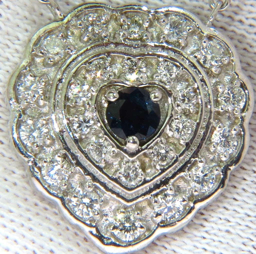 1.25CT NATURAL SAPPHIRE DIAMOND CLUSTER NECKLACE 14KT **: Title: 1.25CT NATURAL SAPPHIRE DIAMOND CLUSTER NECKLACE 14KT ** Description: ONLY MAGNIFICENT JEWELS .25ct. Natural Sapphire 1.00ct. diamonds Modified cluster H-color Vs-2 clarity 19.20 X 19.50mm 16.5