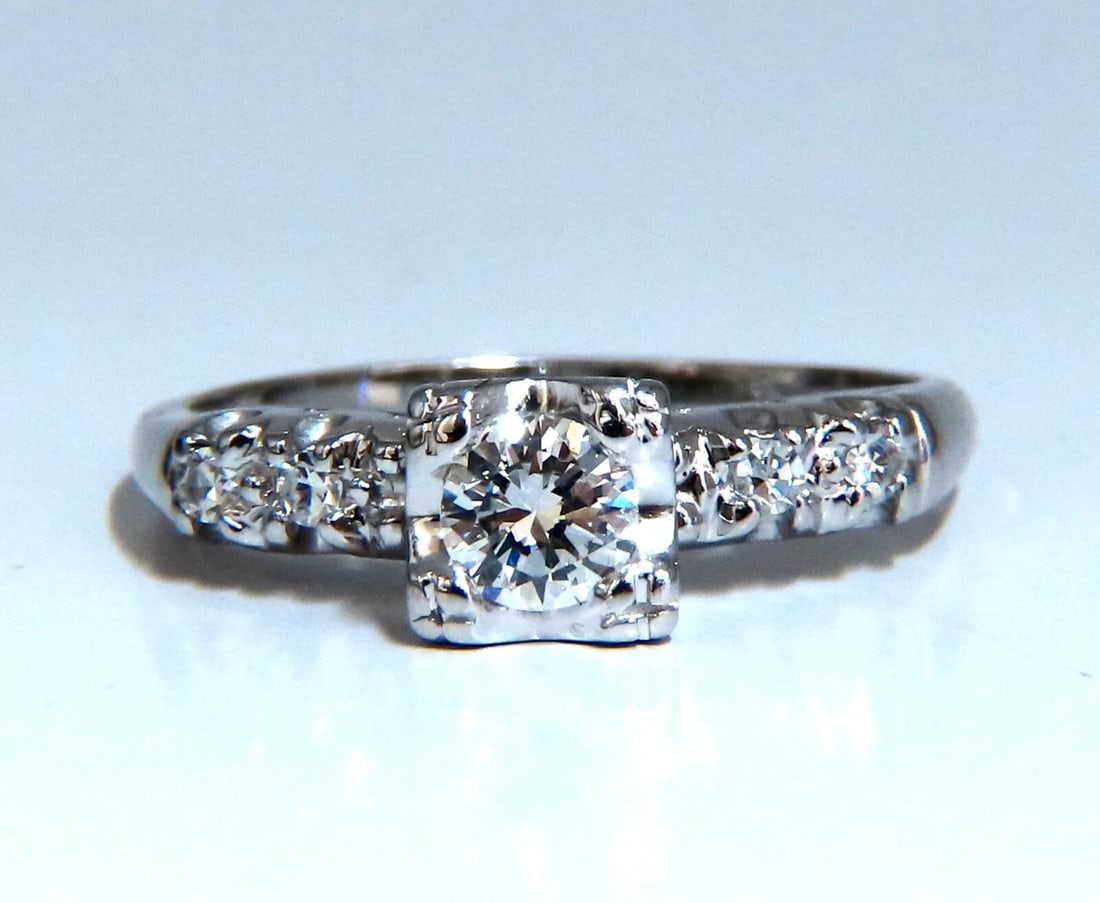 .46ct Natural Round Cut Diamond Ring Vintage 14kt**: Title: .46ct Natural Round Cut Diamond Ring Vintage 14kt** Description: Vintage Elegance .40ct Natural Round Cut Diamond 4.7mm diameter Vs-2 clarity F-G color. Side round Diamonds: .06ct G-color Vs-2 