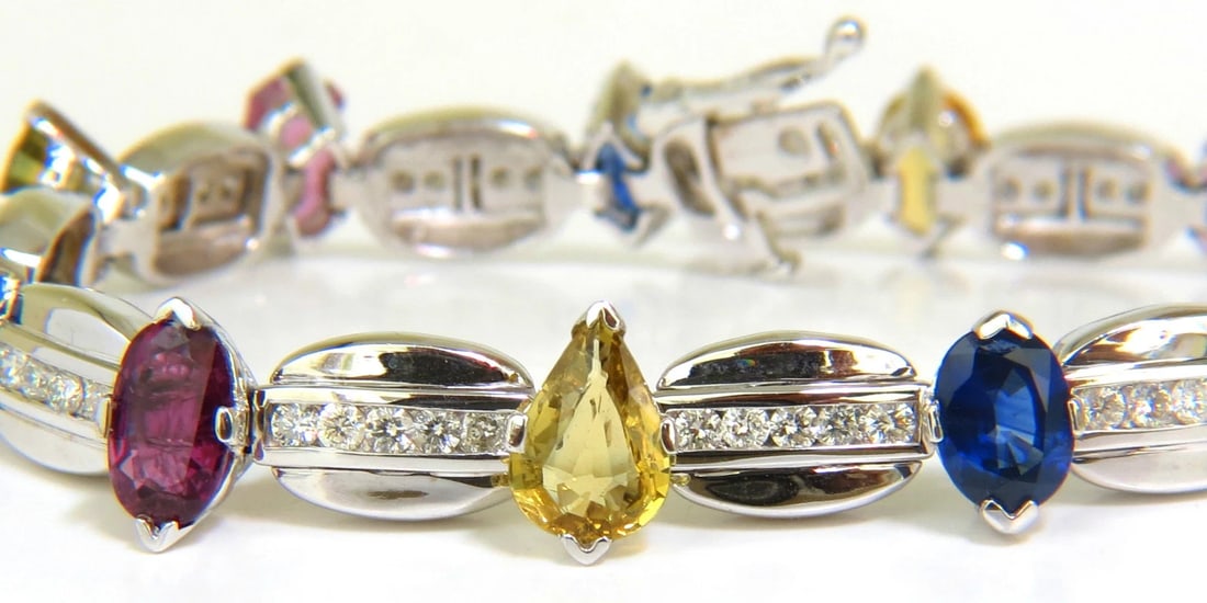 8.25CT NATURAL FINE GEM VIVID COLORS SAPPHIRE DIAMOND BRACELET 14KT**: Title: 8.25CT NATURAL FINE GEM VIVID COLORS SAPPHIRE DIAMOND BRACELET 14KT** Description: 13.60ct. Natural Multi colored Sapphires Features Oval Blues Emerald cut pinks and yellow Lavender oval and pe