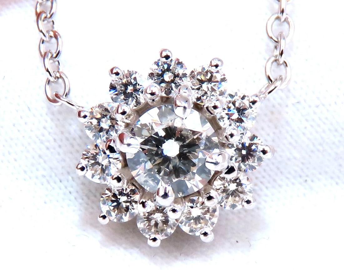 1.40ct natural diamonds halo cluster necklace 14kt**: Title: 1.40ct natural diamonds halo cluster necklace 14kt** Description: Halo diamond cluster 1.40ct. Total Natural diamonds necklace .70ct. Center diamond .70ct Side Diamonds G-color Vs-2 clarity.