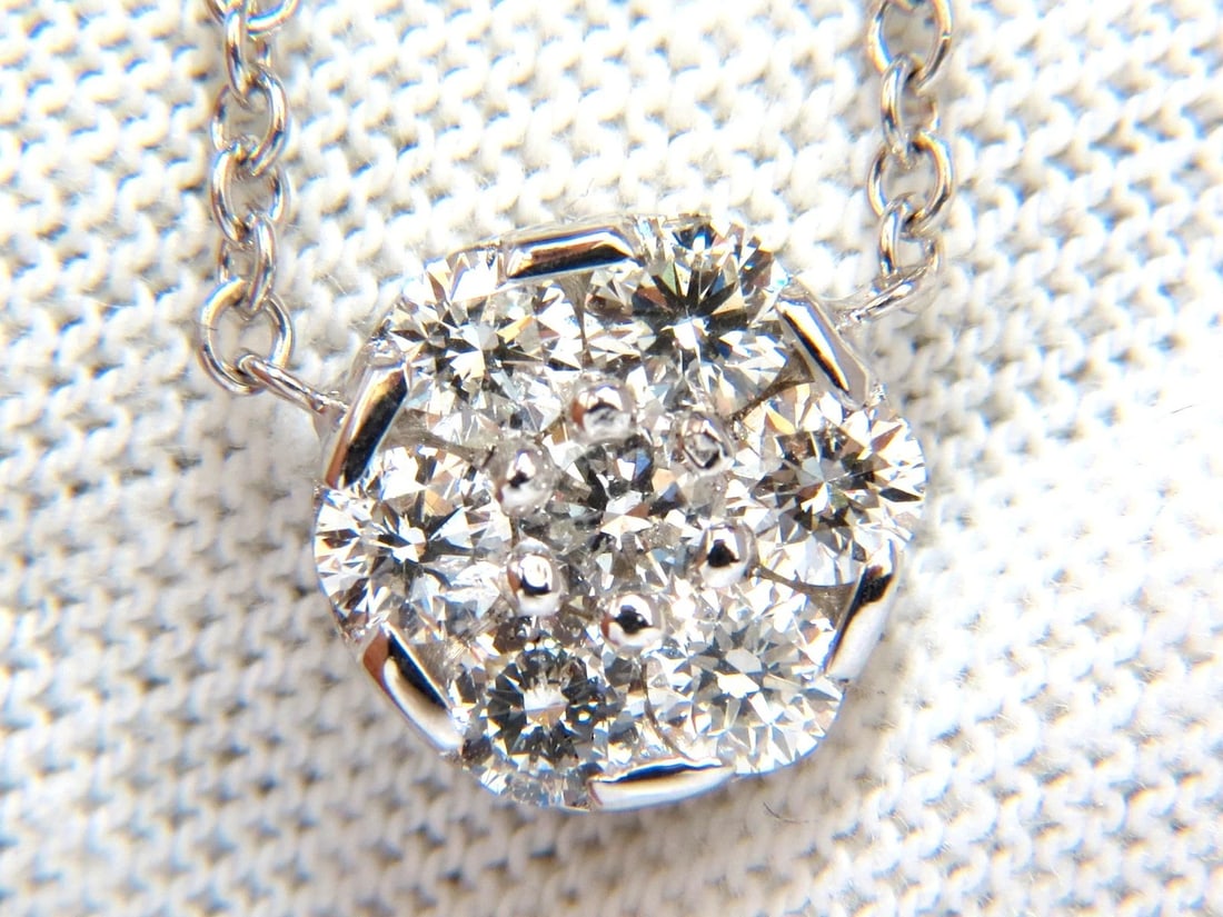 1.00ct Diamond cluster necklace 14kt 18 inch**: Title: 1.00ct Diamond cluster necklace 14kt 18 inch** Description: 7 diamond cluster 1.00ct. Natural diamonds Full cut round brilliant Vs-2 Clarity. G-color 14kt. white gold. cluster diameter: .40