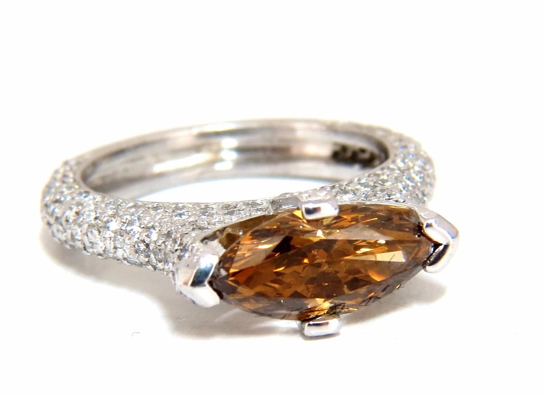 GIA certified 1.46ct Fancy Dark Yellow Brown Diamond Ring Platinum**: Title: GIA certified 1.46ct Fancy Dark Yellow Brown Diamond Ring Platinum** Description: Modern Marquise GIA 1.46ct Natural Fancy color diamond ring. Marquise, Brilliant Natural, Fancy Dark Yellow