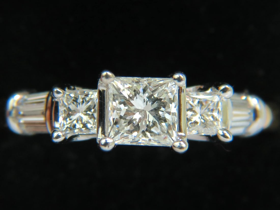 1.30CT CLASSIC PRINCESS NATURAL DIAMOND RING 14KT I/SI-2**: Title: 1.30CT CLASSIC PRINCESS NATURAL DIAMOND RING 14KT I/SI-2** Description: ONLY MAGNIFICENT JEWELS .65ct. Natural diamond ring. Princess cut, Brilliant & full cut. Durable mounted I-color, Si-2