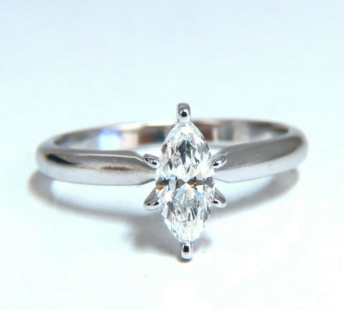 .52ct Natural Marquise Diamond Solitaire Engagement Ring 14Kt**: Title: .52ct Natural Marquise Diamond Solitaire Engagement Ring 14Kt** Description: Classic Raised Solitaire .52ct. Marquise cut diamond ring. H-color Vs-2 clarity 14Kt white Gold 2.2 grams. current