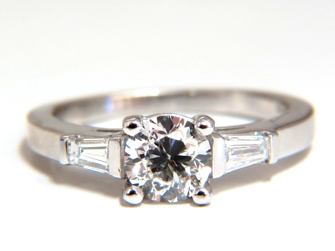 GIA Certified .90ct + .36ct Round Natural Diamond Engagement Ring Platinum**: Title: GIA Certified .90ct + .36ct Round Natural Diamond Engagement Ring Platinum** Description: Modernist Solitaire & Accent. GIA Certified Diamond engagement ring. .90ct. Natural Round Cut diamond G