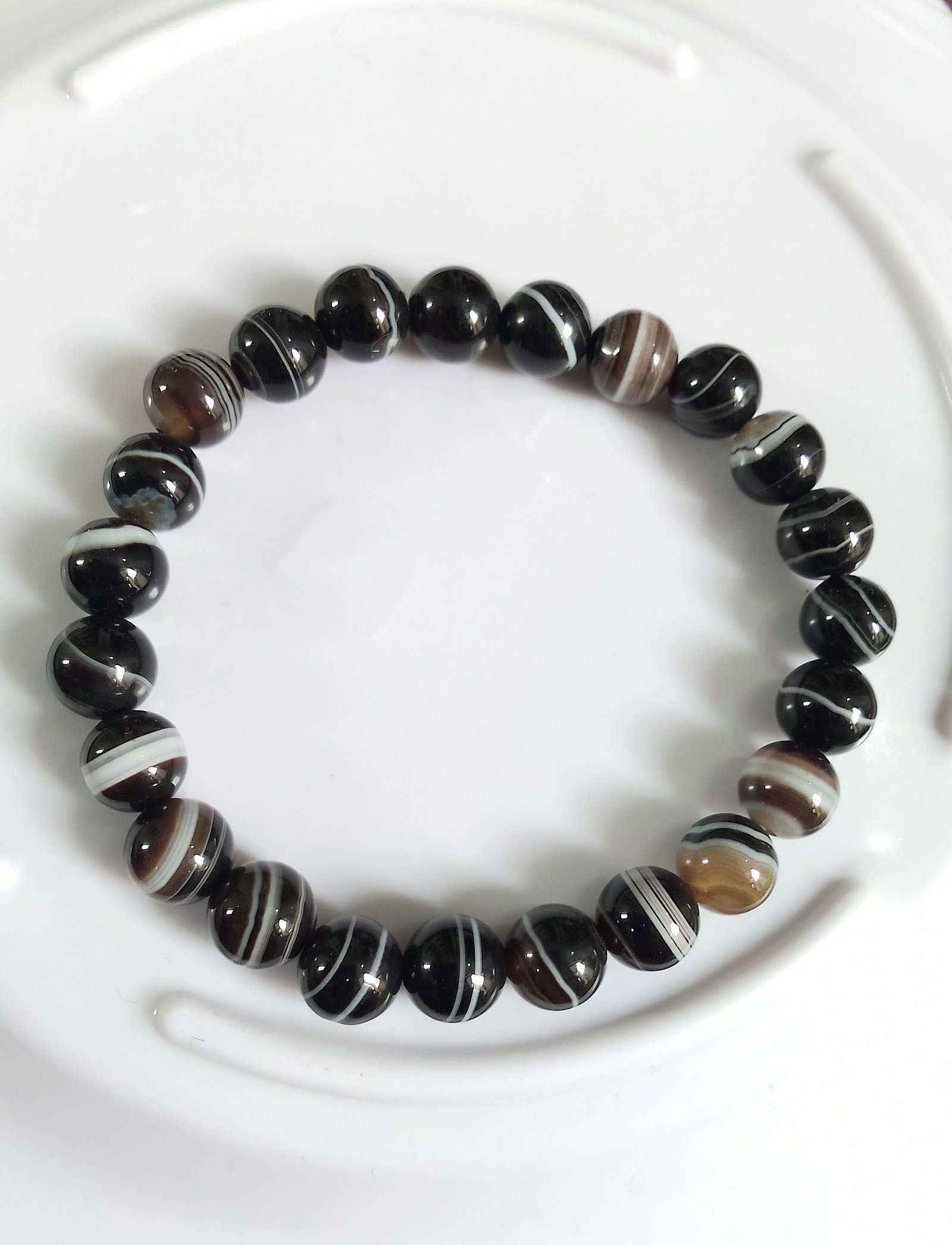 82.95 Carat Black Sulemani Hakik Healing Stretchable Bracelet: Title: 82.95 Carat Black Sulemani Hakik Healing Stretchable Bracelet Description: Bracelet Detail Design : Healing Stretchable Bracelet Stone Name : Black Sulemani Hakik Color : Black & Rainbow