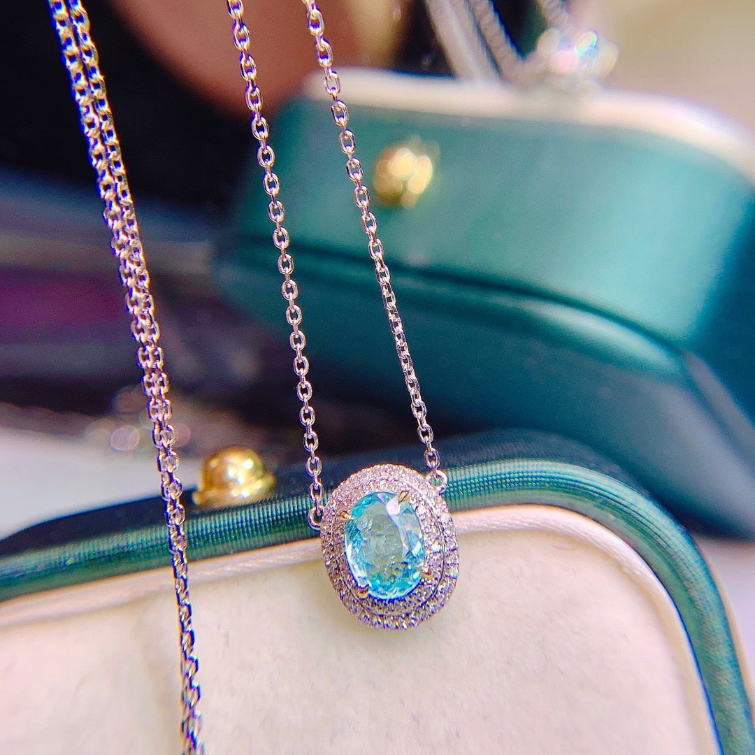 14K GOLD 0.76 CT NATURAL PARAIBA TOURMALINE & DIAMOND NECKLACE: Title:14K GOLD 0.76 CT NATURAL PARAIBA TOURMALINE & DIAMOND NECKLACE Description:Ref:230656489Gold Content:14K GoldMain Gemstone:Paraiba TourmalineNumber of stones:1Shape:OvalCarat Weight:0.76ct