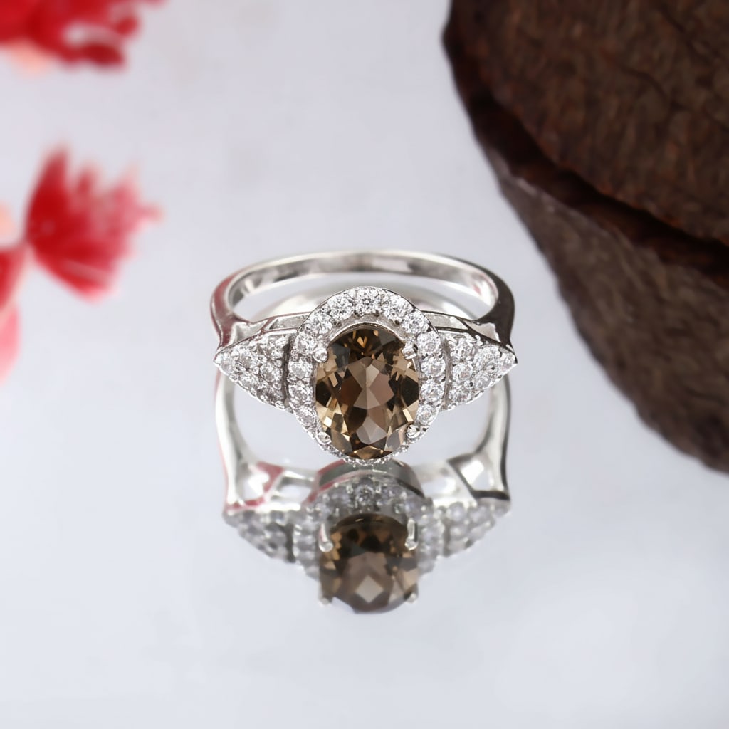 1.3 Carat Smocky Quartz, Cubic Zirconia 925 Sterling Silver Halo Ring: Title: 1.3 Carat Smocky Quartz, Cubic Zirconia 925 Sterling Silver Halo Ring Description: Ring Detail Design : Halo Ring Stone Name : Smocky Quartz, Cubic Zirconia Color : Brown & White Shape : Oval,