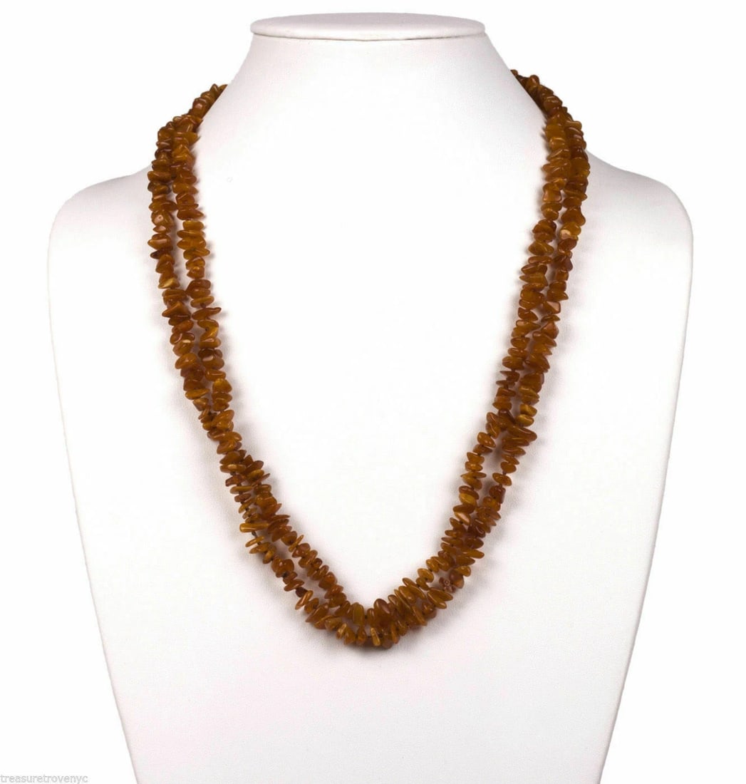 Baltic Amber Chip Bead Flapper Necklace: Title:Baltic Amber Chip Bead Flapper Necklace Description:Gorgeous, long Baltic amber chip bead necklace, recently restrung on silk. Circa, 1980’s. Necklace measures, 53” long and