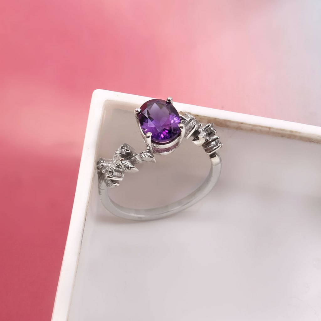 1.2 Carat Amethyst, Cubic Zirconia 925 Sterling Silver Filigree Ring: Title: 1.2 Carat Amethyst, Cubic Zirconia 925 Sterling Silver Filigree Ring Description: Ring Detail Design : Filigree Ring Stone Name : Amethyst, Cubic Zirconia Color : Purple & White Shape : Oval,