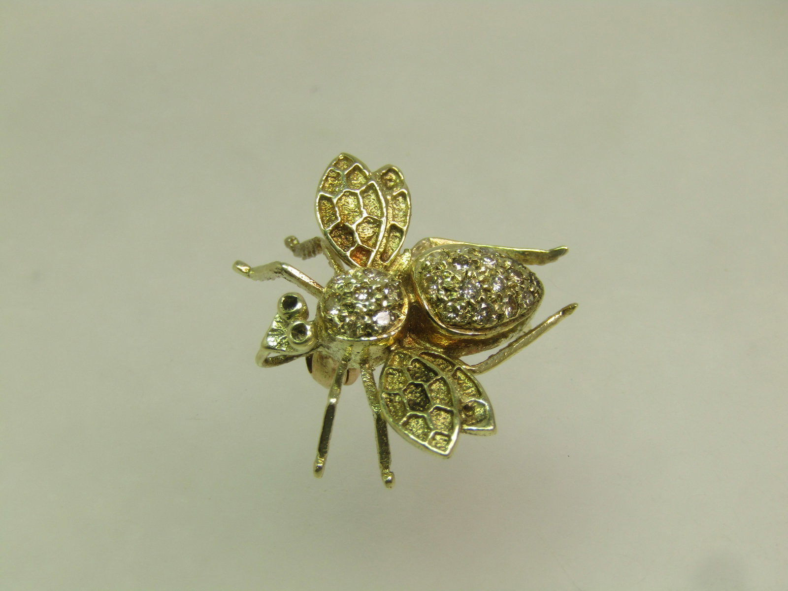 Vintage 14kt Diamond Bee Brooch/Pendant, 1970's, 22 Diamonds: Title:Vintage 14kt Diamond Bee Brooch/Pendant, 1970's, 22 Diamonds Description:Vintage 14kt Diamond Bee Brooch/Pendant, 1970's, 22 Diamonds. Fifteen round diamonds in the body and seven at the head.