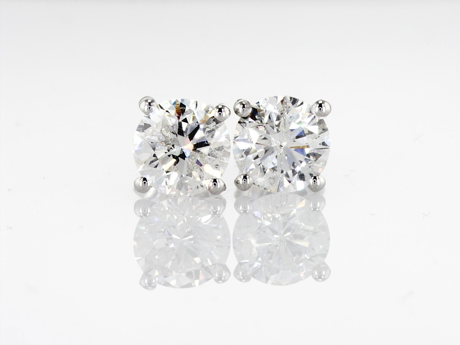 3.21cttw Natural Earrings 14K White Gold 1.3 gr: Title:3.21cttw Natural Earrings 14K White Gold 1.3 gr Description: Reserve: $6,900.00 Shipping: Domestic: Shipping rates are determined by destination International: Foreign shipping rates are