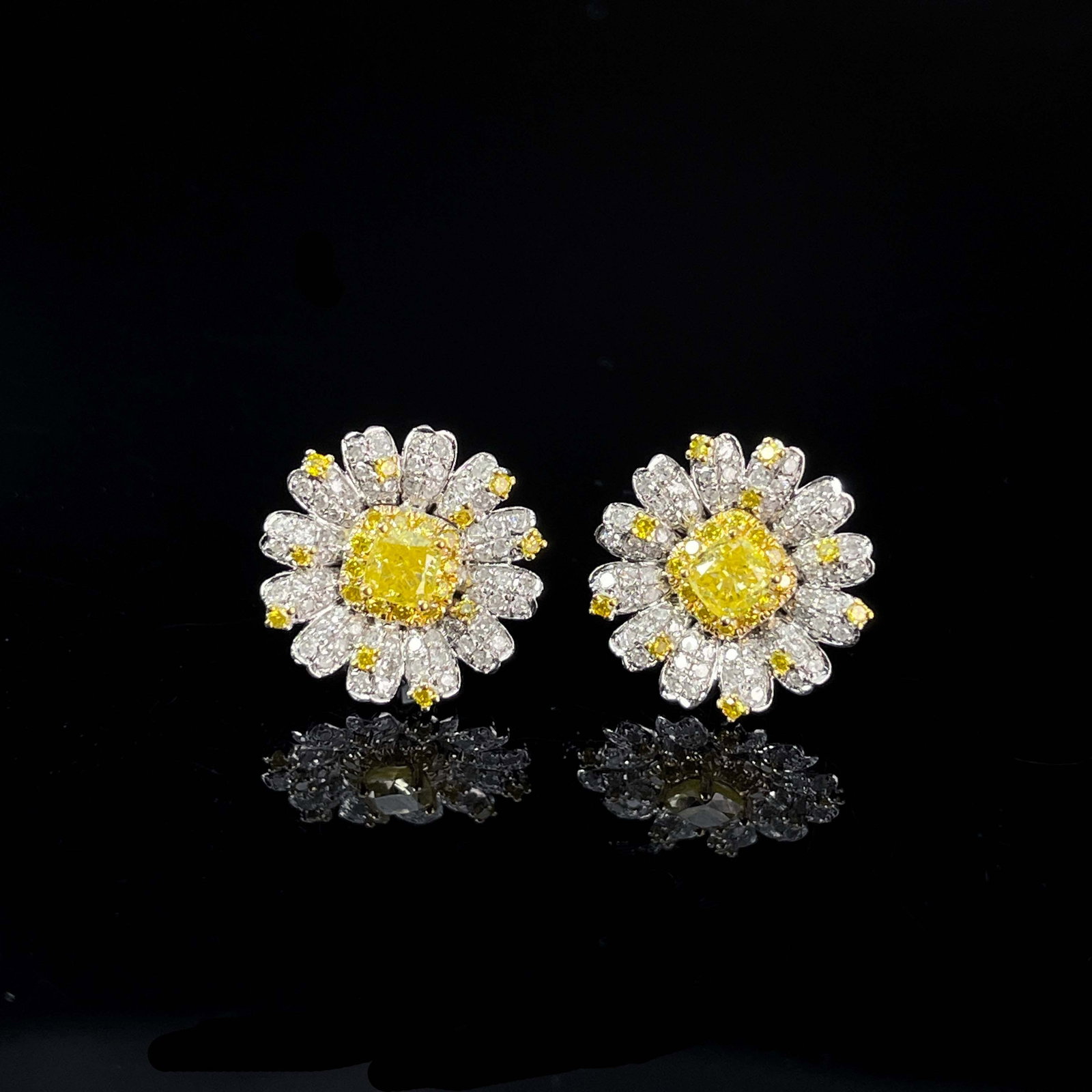 14K GOLD 1.15 CTW NATURAL YELLOW DIAMOND & DIAMOND EARRINGS: Title:14K GOLD 1.15 CTW NATURAL YELLOW DIAMOND & DIAMOND EARRINGS Description:Ref:230655312Gold Content:14K GoldMain Gemstone:Yellow DiamondNumber of stones:2Shape:CushionCarat Weight:0.4ct