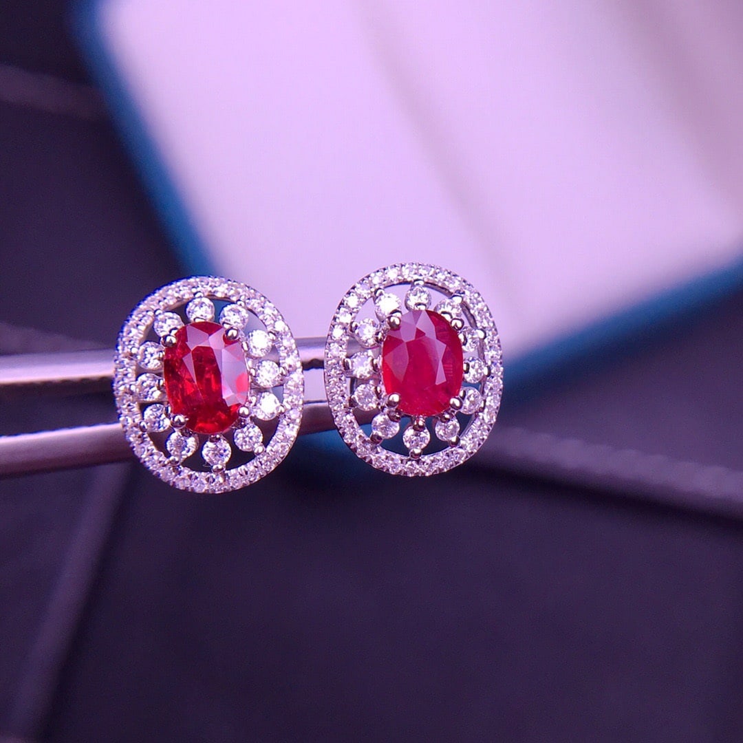 14K GOLD 0.9 CT NATURAL RUBY & DIAMOND EARRINGS: Title:14K GOLD 0.9 CT NATURAL RUBY & DIAMOND EARRINGS Description:Ref:230656493Gold Content:14K GoldMain Gemstone:RubyNumber of stones:2Shape:OvalCarat Weight:0.9ct Color:PigeonBlood