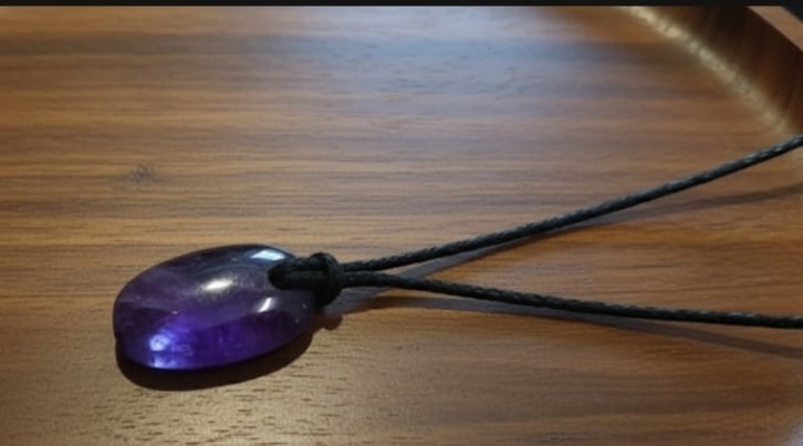 Amethyst Oval Pendant With Adjustable Black Cord: Title: Amethyst Oval Pendant With Adjustable Black Cord Description: Pendant Detail Design : Oval Pendant With Adjustable Black Cord Stone Name : Amethyst Color : Purple Measurment : 18x25 MM Shape : 