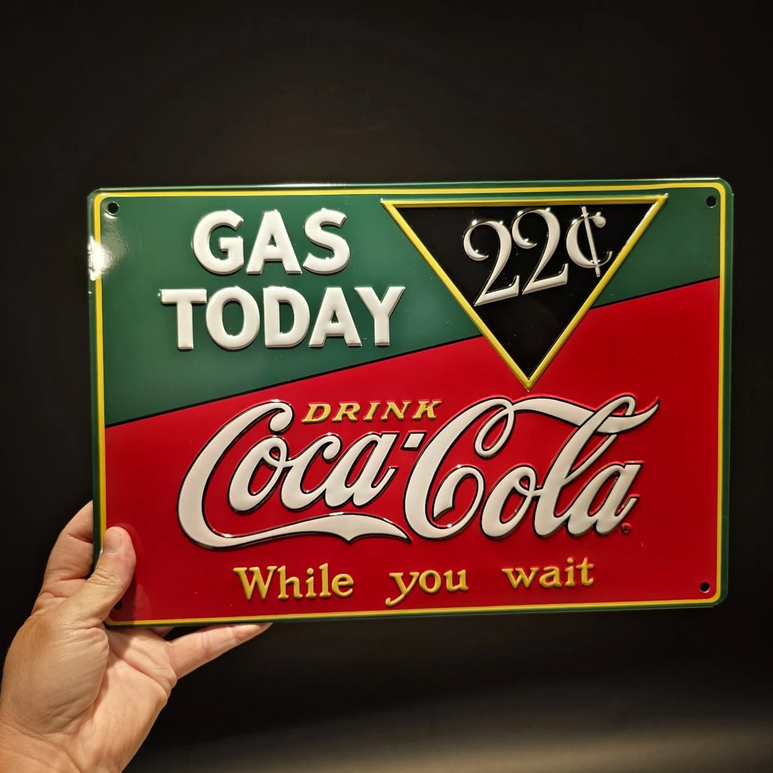15" Coca-Cola Metal Vintage Style Gas Station Advertising Sign: Metal reproduction Coca-Cola advertising sign featuring "Gas Today 22? - Drink Coca-Cola While You Wait", styled after early roadside service station signage. During the early to mid-20th century, gas