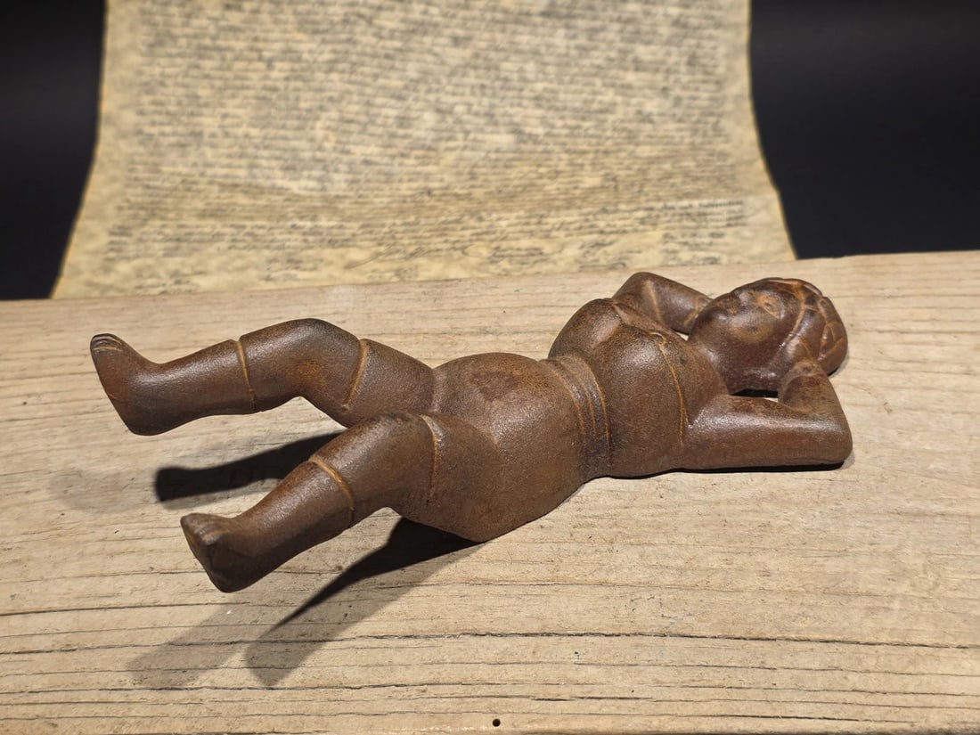 8.5" Cast Iron Figural Boot Jack Lady Boot Remover: Cast iron figural boot jack styled after late-19th and early-20th century novelty household tools. Boot jacks were commonly kept near entryways, mudrooms, and farm porches, allowing muddy or tight