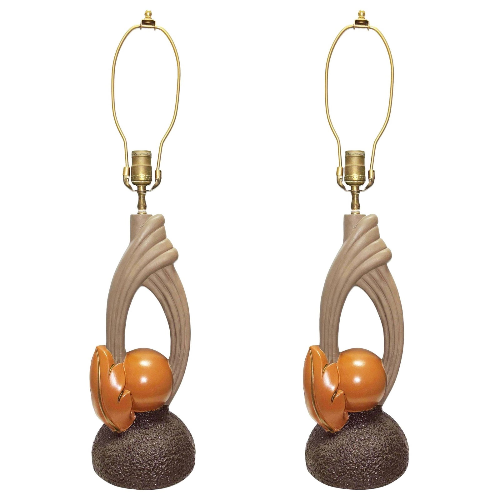 Mid-Century Sculptural Art Pottery Lamp Pair, Circa 1950s: Title: Mid-Century Sculptural Art Pottery Lamp Pair, Circa 1950s Description: Pair of Mid-Century sculptural art pottery lamps featuring an organic, almost Art Nouveau, floral-inspired form with a mod