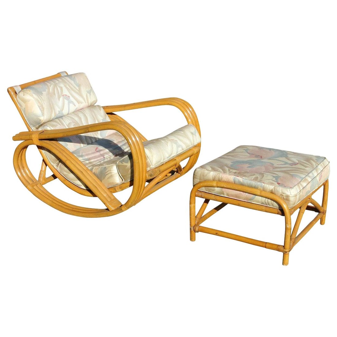 Rare Restored Pretzel Arm Rattan Rocking Chair with Ottoman: Title: Rare Restored Pretzel Arm Rattan Rocking Chair with Ottoman Description: A rare three-strand pretzel arm rattan rocking chair with matching ottoman. This chair features steam bent rattan frame