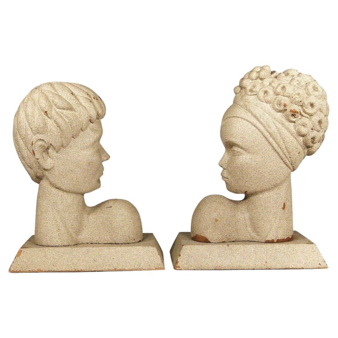 Mid-Century Modern Hawaiian Male and Female Bookends, Pair: Title: Mid-Century Modern Hawaiian Male and Female Bookends, Pair Description: This pair of Hawaiian Mid-Century Modern bookends feature skillfully carved male and female busts that have been coated i