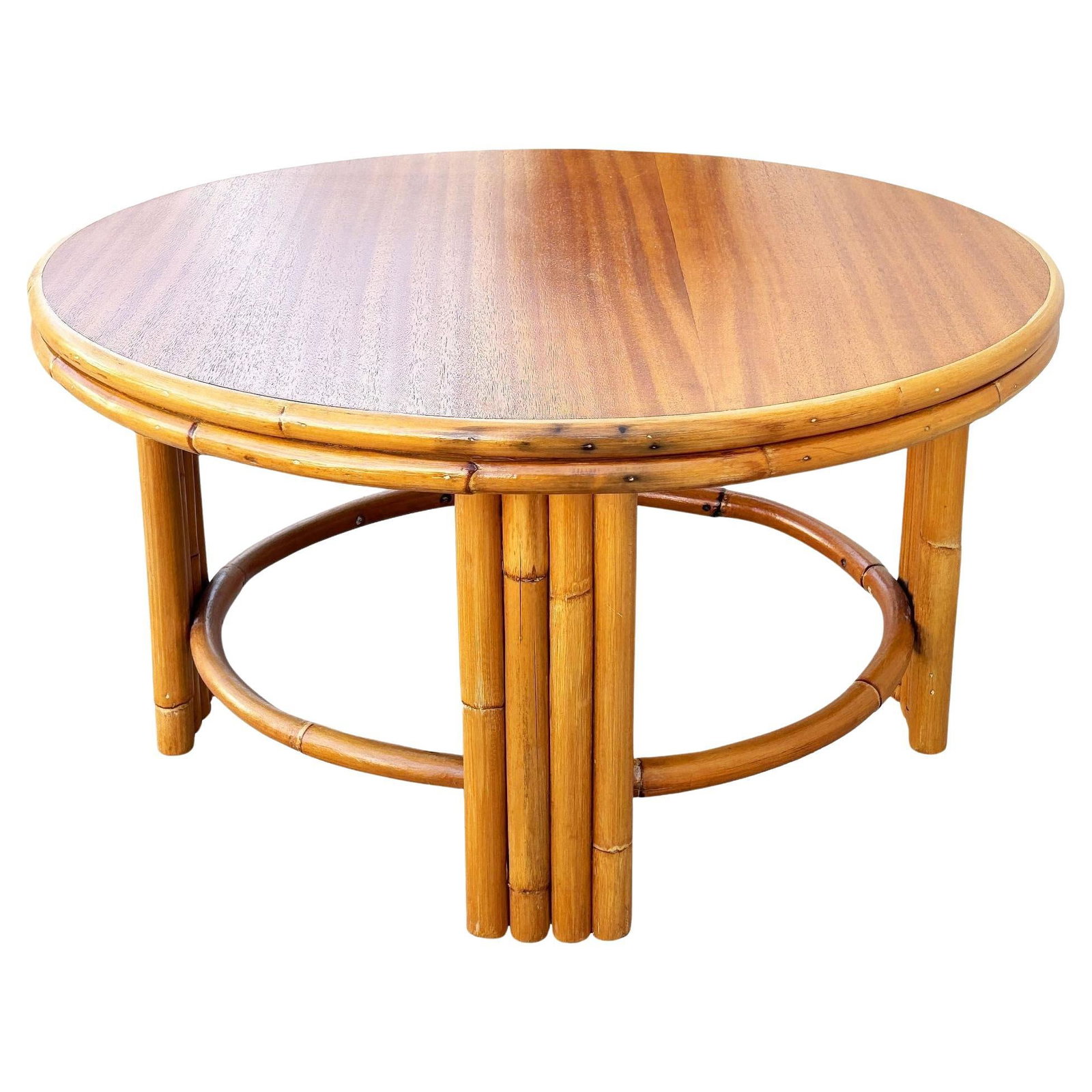 Restored Mid-century O-Base Round Costal Rattan End Table W/ Mahogany Top: Title: Restored Mid-century O-Base Round Costal Rattan End Table W/ Mahogany Top Description: This beautifully restored Mid-century round Rattan coffee table features unique five-pole rattan legs