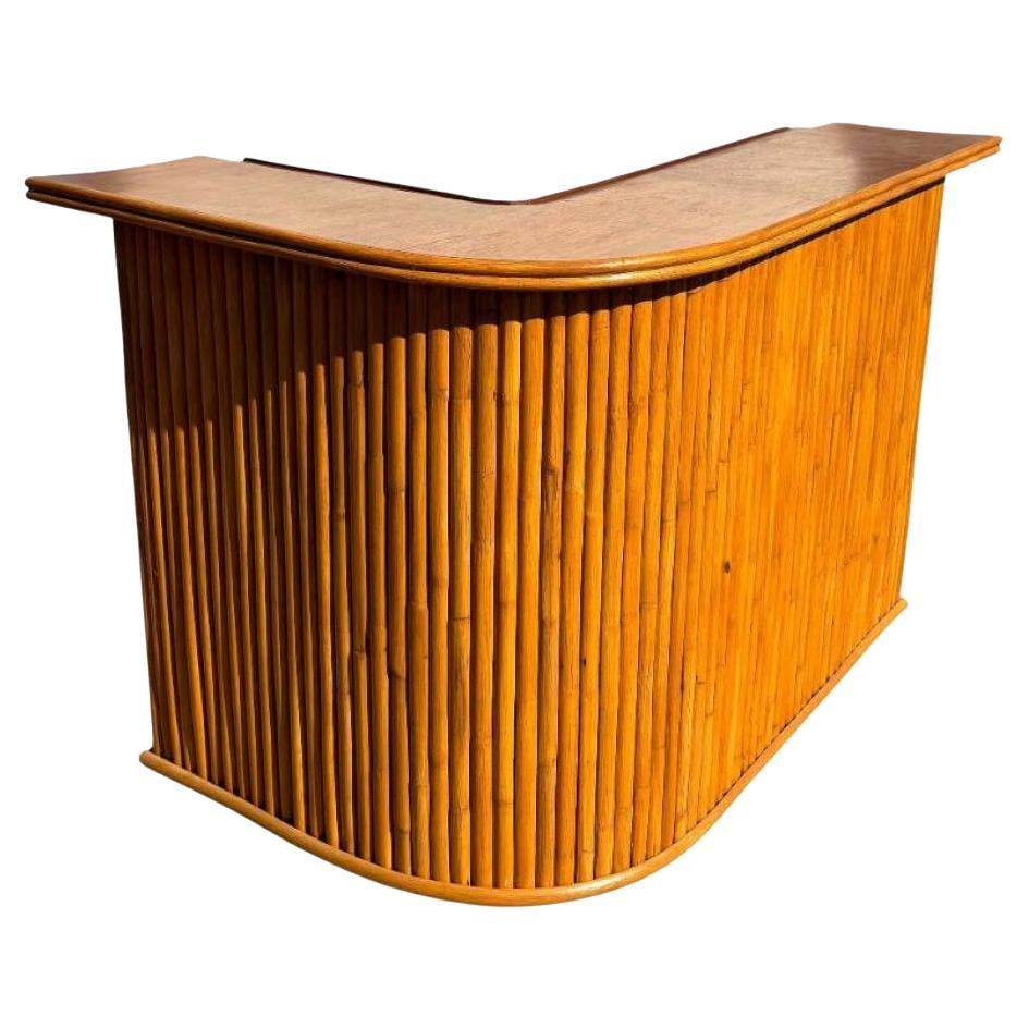 Restored Stacked Rattan & Mahogany L-Shaped Corner Bar: Title: Restored Stacked Rattan & Mahogany L-Shaped Corner Bar Description: This restored dry bar showcases a distinctive stacked rattan design with a polished mahogany frame, exuding vintage tropical