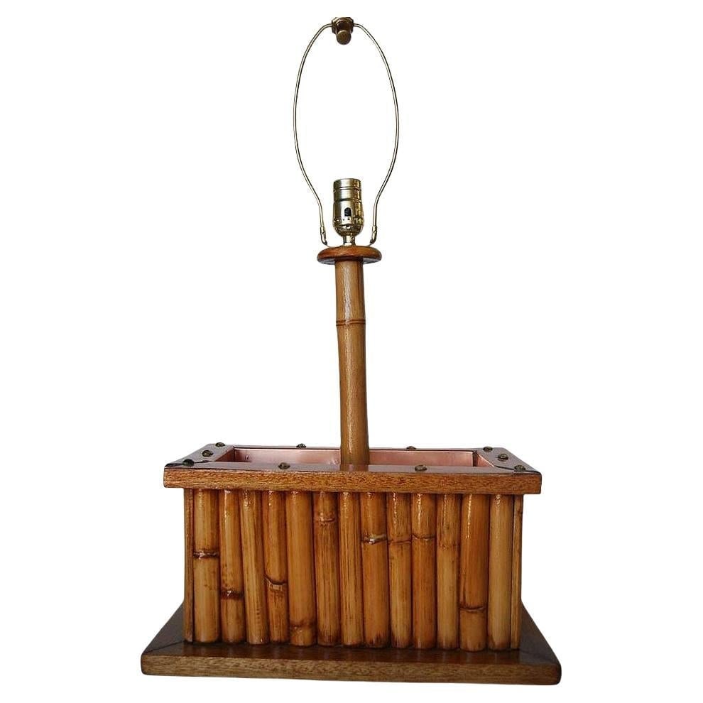 Restored Rare Rattan & Koa Wood Planter Table Lamp w/ Large Copper Accent: Title: Restored Rare Rattan & Koa Wood Planter Table Lamp w/ Large Copper Accent Description: This beautifully rare restored rattan table lamp features a copper planter in the center with a Koa wood