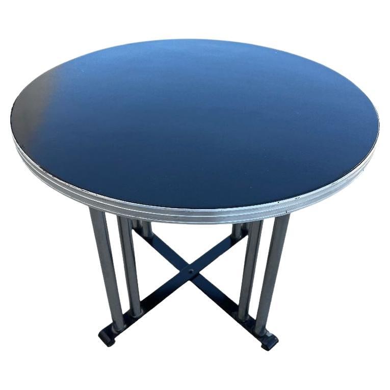 Streamline Art Deco Chrome Round Side Smokers Table: Title: Streamline Art Deco Chrome Round Side Smokers Table Description: Wolfgang Hoffmann inspired round side table with a streamlined design highlighted in its grooved chrome trim, chrome-plated stee