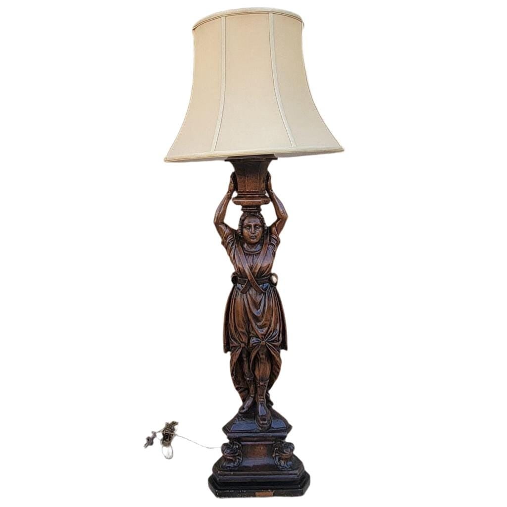 Antique Carved Walnut Figural Lamp: Antique Hand Carved Walnut Figural Lamp with ShadeThis antique figural hand carved lamp is made of Walnut. The figure of the woman is all hand carved and the light is working and has been