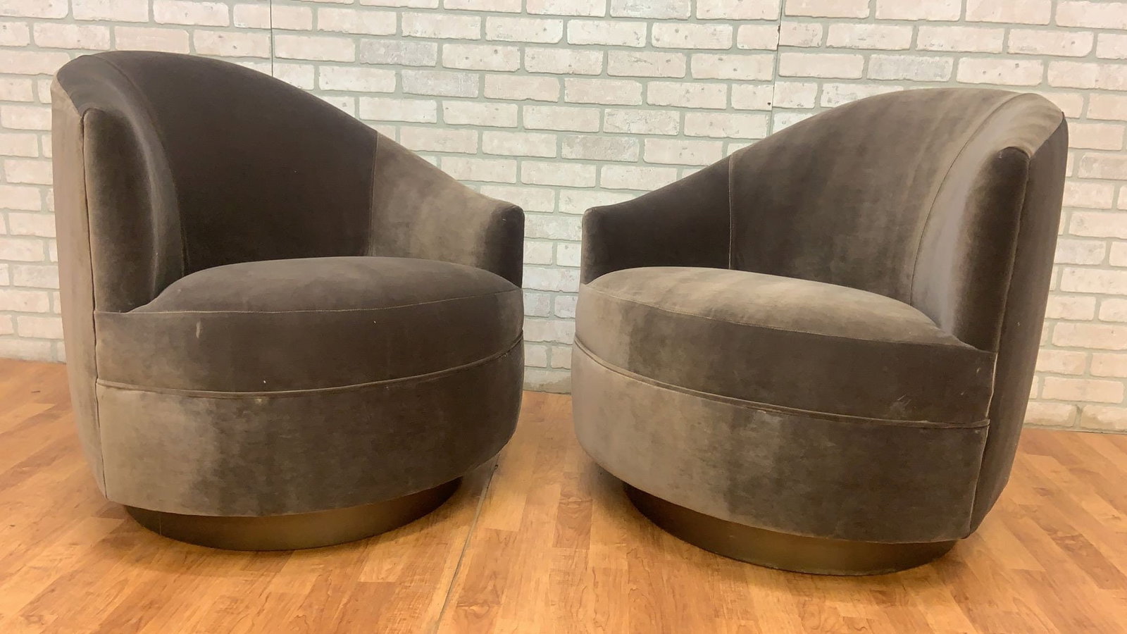 Postmodern Asymmetrical Barrel Back Swivel Chairs Newly Reupholstered in Grey Velvet on a Bronze: Materials: metal, velvetOverall width: 32 inchesOverall height: 32 inchesOverall depth: 32 inchesSeat height: 18 inchesSeat depth: 21 inchesPostmodern Asymmetrical Barrel Back Swivel Chairs Newly