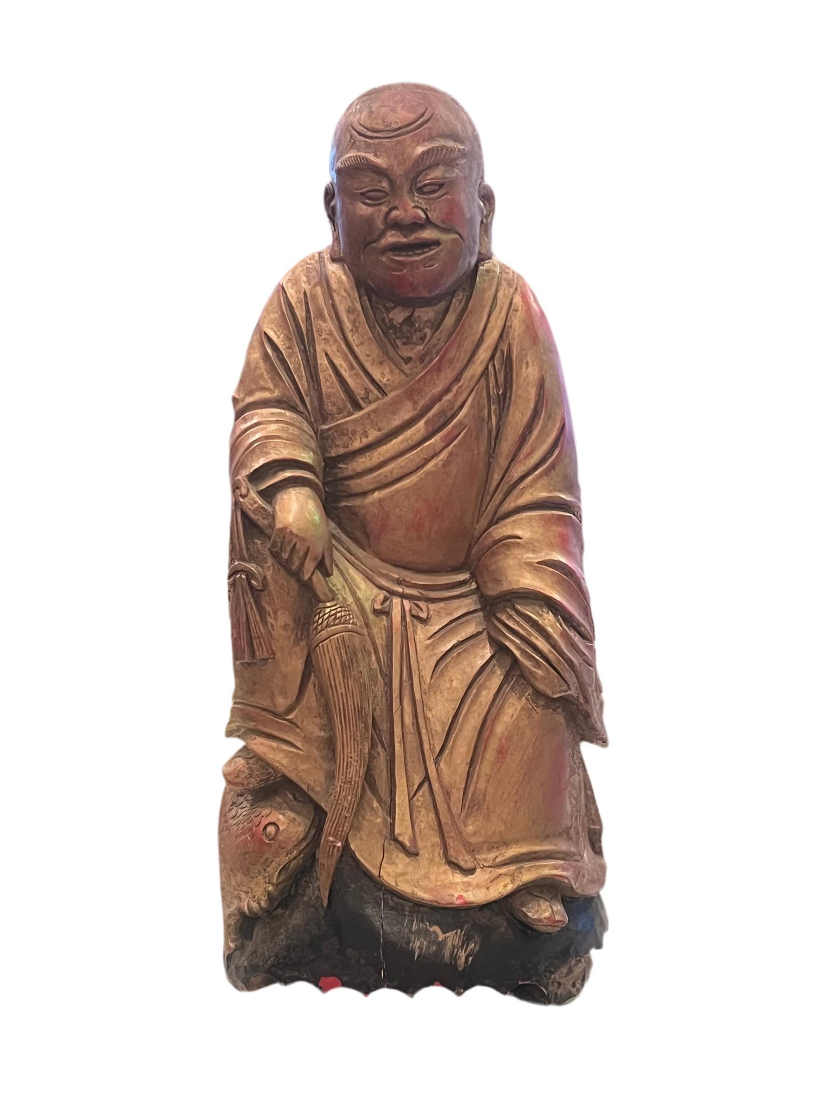 Antique Chinese Carved Monk Figurine: Materials: woodAntique Chinese Wood Hand Carved Monk Figurine Circa Early 20th Century DimensionsH 10”W 5”D 4”CONDITION:Please be aware that all items are used/vintage/antique and