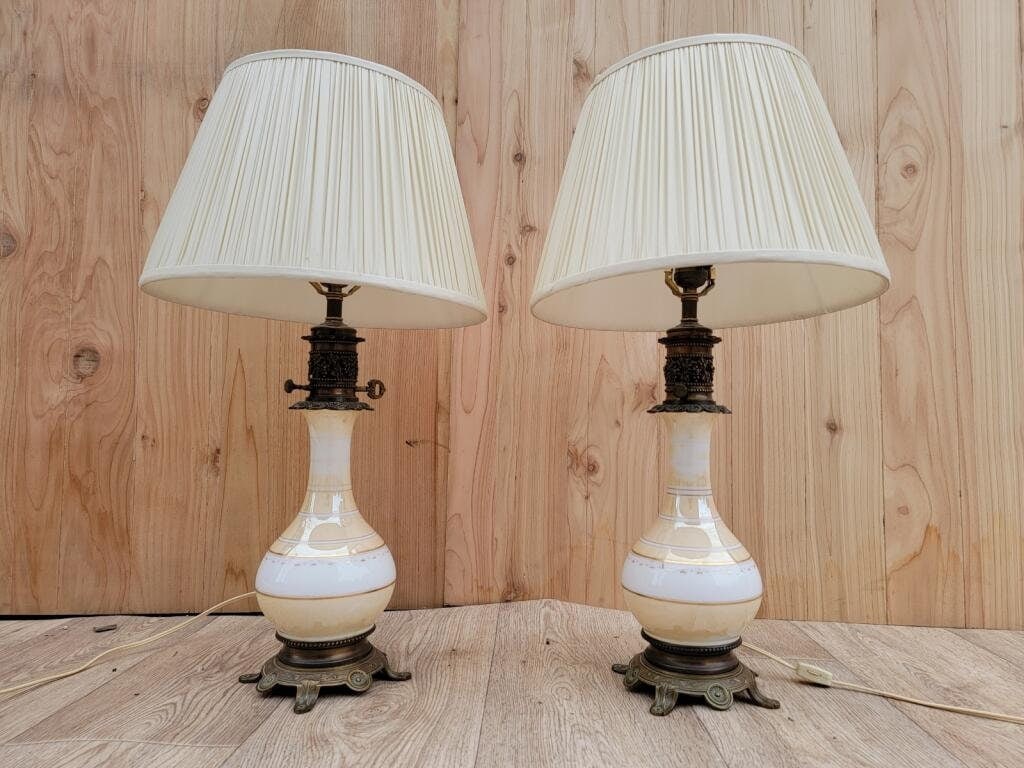 Antique French Napoleon III Style Celadon Table Lamps - Pair: Materials: CeramicAntique French Napoleon III Style Celadon Glazed Ceramic and Brass Electric Table Lamps - PairGorgeous pair of Napoleon III Celadon glazed hand painted ceramic, ornate brass table