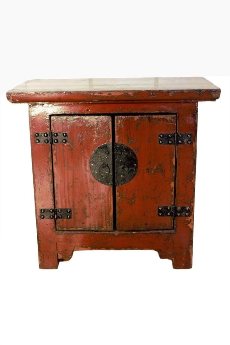 Antique Chinese Red Lacquer Kang Storage Cabinet: Materials: woodAntique Authentic Chinese Red Lacquer Kang 2 Door CabinetThis piece is made of Yumu or Northern Elm Wood. It was originally used in a bedroom in Shanxi China to store personal