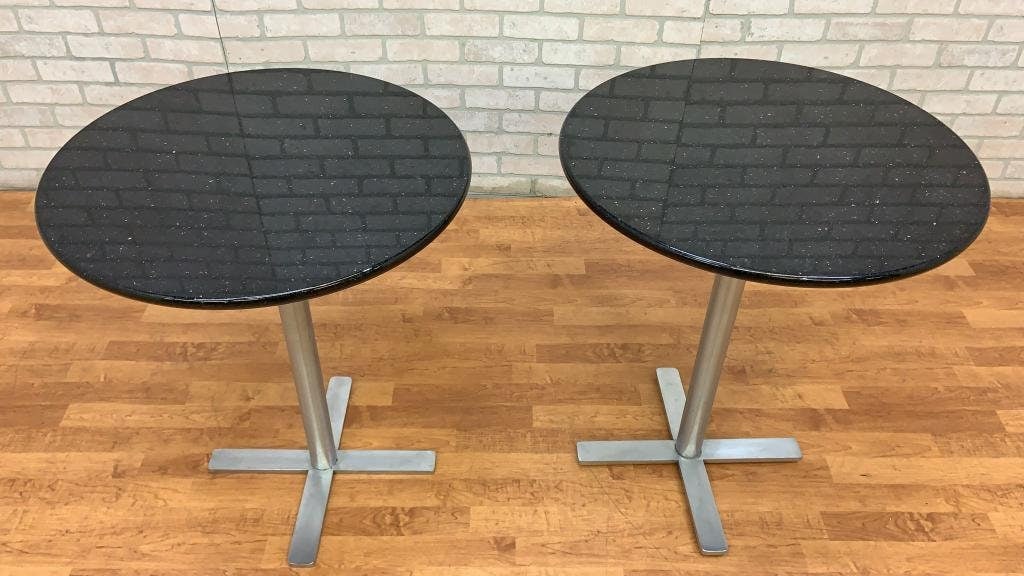 Vintage Granite Top Bistro Side Tables - Pair: Materials: Granite, Metal, SteelWidth: 24 inchesHeight: 28.5 inchesDepth: 24 inchesVintage Granite Top Bistro Side Tables - PairCirca: Late 20th CenturyDimensions:W: 24"D: 24"H: 28.5"CONDITION: